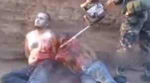 داعش 9 نفر را با اره برقی اعدام کرد!!!!!